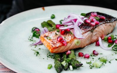 Image of salmon on a plate with vegetables