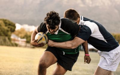 Image shows rugby tackle without shoulder injury